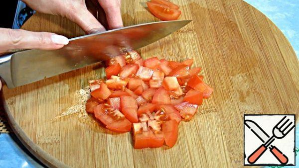 Similarly, we cut the tomato.