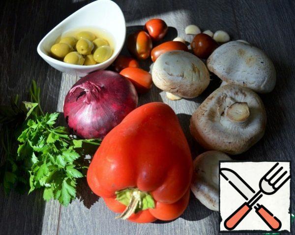 Turn on the oven to warm up. Prepare the vegetables.