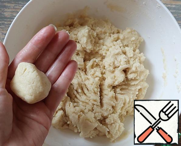 Knead the dough. The dough should gather into a ball when pressed.