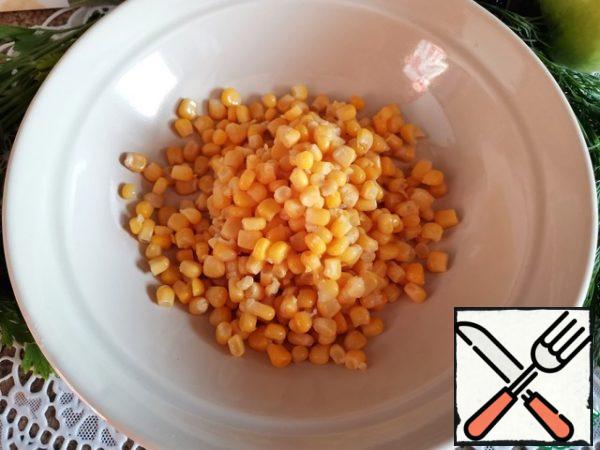 Drain the water from the corn.