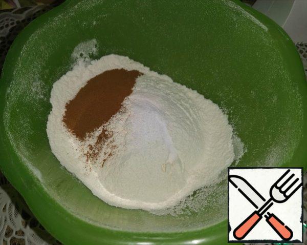 Sift flour, pour in coffee, soda and mix well.
