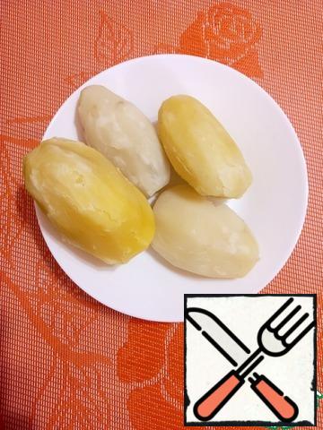 This recipe is just a lifesaver for busy housewives. So, peel the potatoes and boil in salted water until tender. Drain the water and cool the potatoes. Yesterday's potatoes are also perfect for this recipe.