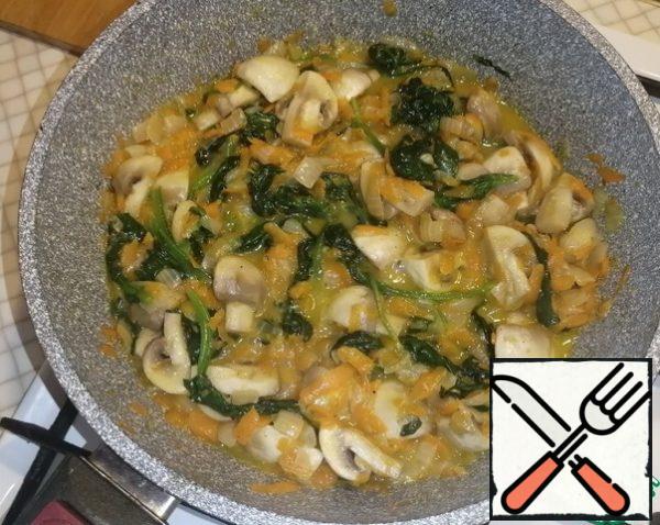 Salt and pepper to taste, mix. Spinach will greatly decrease and become soft, so I don't cut it, it's convenient for us to eat this way in many recipes. If it bothers you, you can cut it.