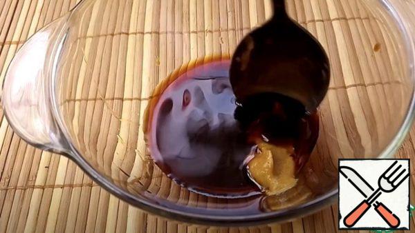Combine mustard and soy sauce, remove to the side.