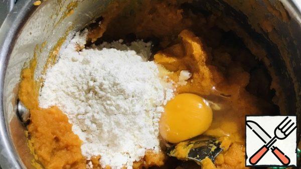Drain all the water from the sweet potato, (cool slightly) punch with an immersion blender, add butter, flour and egg - try for salt and pepper.