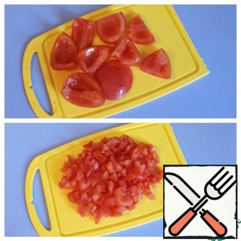 Cut tomatoes and remove the watery part, cut very finely.