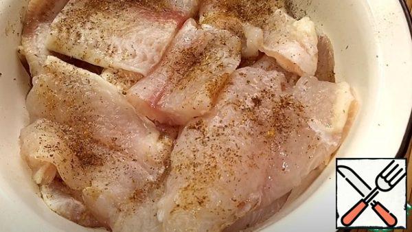 Pepper and sprinkle with seasoning on both sides. We put that aside.