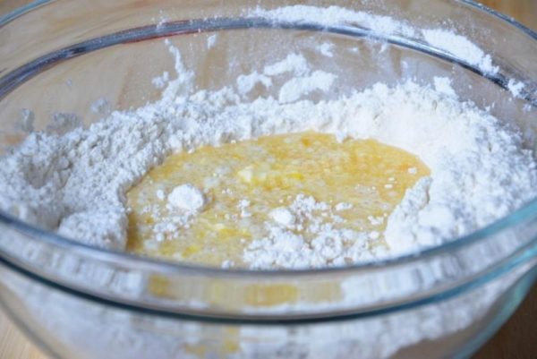 Pour the cooled milk mixture into the flour mixture and knead to form a soft dough.



