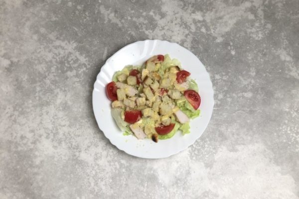 Lastly, pour the sauce over the entire salad again. Serve immediately to prevent the croutons from becoming soggy.