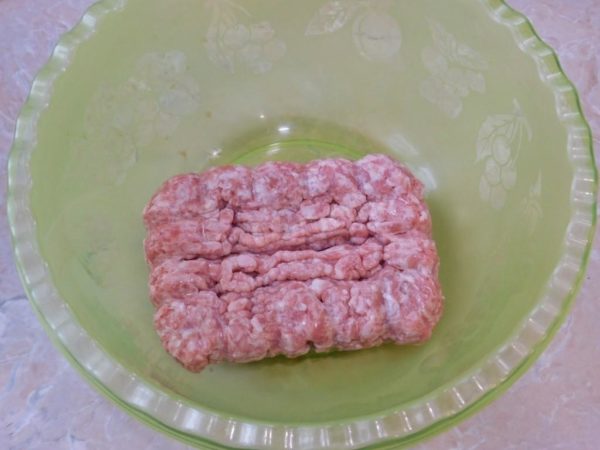 Begin by gathering the required ingredients. Minced meat from any type of meat or a combination of meats can be used. For this recipe, I'm using minced pork. Place the minced meat in a deep bowl.


