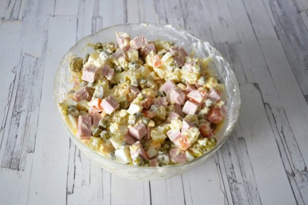 Thoroughly mix the salad, tasting and adjusting salt as needed. Allow the olivier to chill in the refrigerator for an hour; it's best served cold. Bring it to the table and enjoy your meal!







