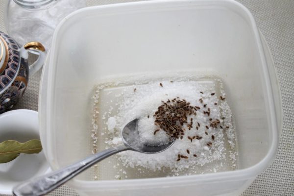 Introduce dill seeds or cumin to the salt mixture, ensuring a well-mixed combination of savory and sweet flavors.


