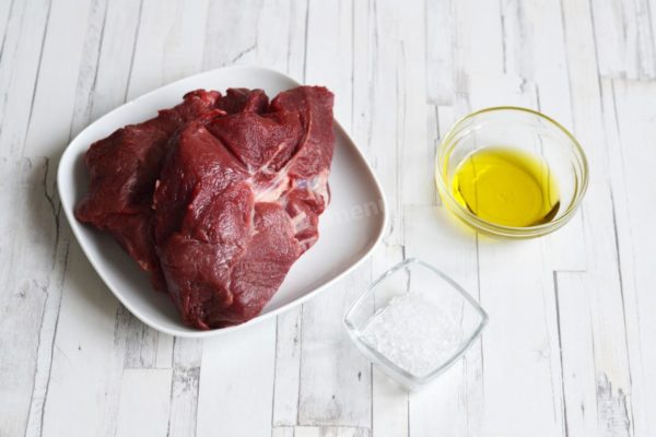 Begin by gathering all the necessary ingredients. To ensure even cooking, take the rib eye beef steak out of the refrigerator in advance and let it reach room temperature for at least 1-2 hours. The meat should have a consistent temperature inside and out. Avoid cooking a steak from frozen meat, as it won't be as juicy and tender as fresh.


