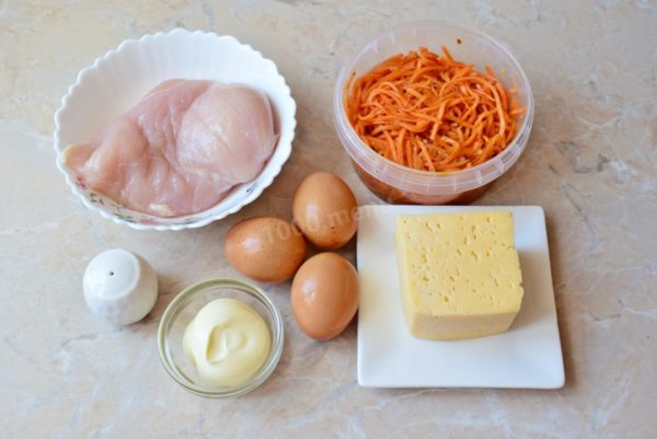 Commence the preparation of the Korean carrot and chicken salad by assembling the necessary ingredients. Korean carrots can either be prepared from scratch or purchased ready-made. Choose a cheese variety that suits your taste, ensuring it's easy to grate. For an added flavor boost, consider incorporating a small amount of garlic.


