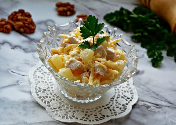 Arrange the salad in a bowl, garnish with herbs if desired, and serve. For a festive presentation, consider layering the salad in a serving ring for a more spectacular appearance. Enjoy your meal!
