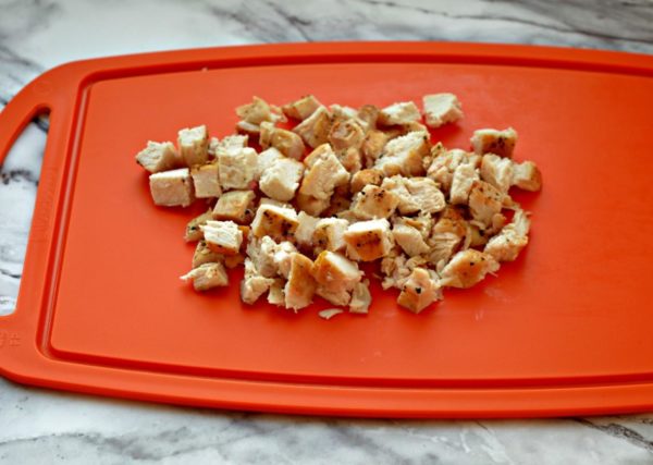 Cut the cooled chicken breast into small cubes.

