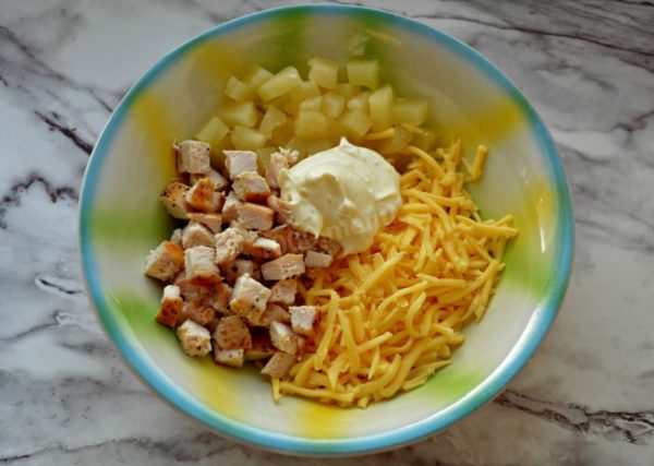 Combine all the prepared ingredients in a deep dish and add the garlic dressing. Gently mix the salad. Taste a sample and, if needed, add salt to taste.

