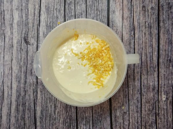 Add the lemon zest. I added 2 teaspoons of freshly squeezed lemon juice to the cream to enhance the flavor.


