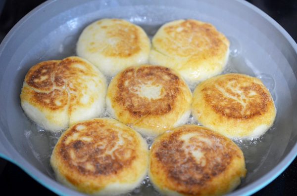 Carefully flip the pancakes and continue cooking for another 7-10 minutes. You can cover the pan with a lid to ensure that the pancakes are fully cooked through in the center as well.


