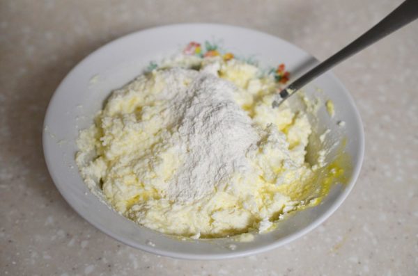 Sift the flour (leaving 1 tablespoon for dredging). I recommend not skipping this step, as sifting the flour helps it absorb oxygen, resulting in airier and more delicate pancakes. Add the sifted flour to the cottage cheese mixture and thoroughly combine everything.


