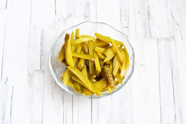 Slice the pickles into strips. Typically, pickled cucumbers are used in hodgepodge, but regular cucumbers will work as well. If you don't have pickles, you'll need about 2 regular cucumbers.



