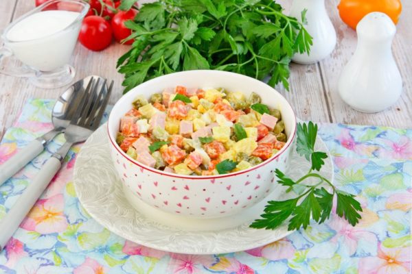 Before serving, you can either slightly cool the winter Olivier salad or serve it immediately. Enjoy your meal!
