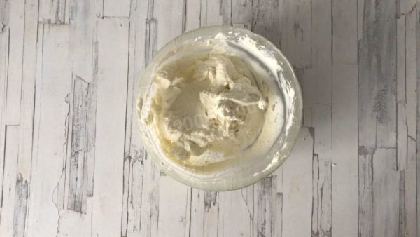Use a mixer to beat the cottage cheese mixture on low speed until it becomes smooth.


