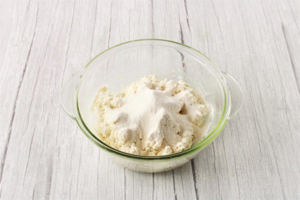 Sift the flour and incorporate it into the mixture, stirring until well combined. If the dough appears too sticky, you can add a small additional amount of flour (no more than 0.5 tablespoons).

