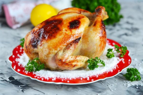 To check if the chicken is done, insert a knife into the meat. If the knife goes in easily, and the juices run clear, it's ready. If the juices are pink or red, continue cooking. Enjoy your meal!
