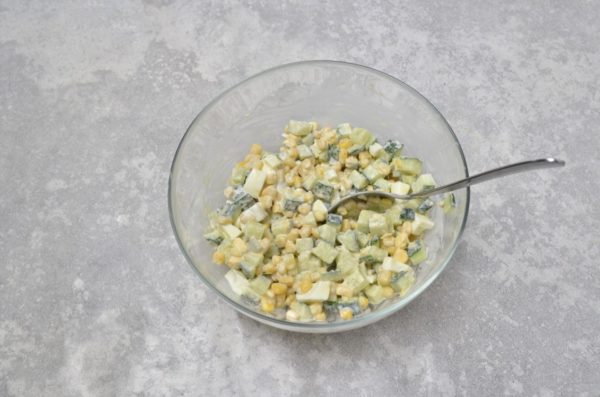 Add mayonnaise to the salad and mix well. If you prefer, you can use sour cream as a substitute for mayonnaise.


