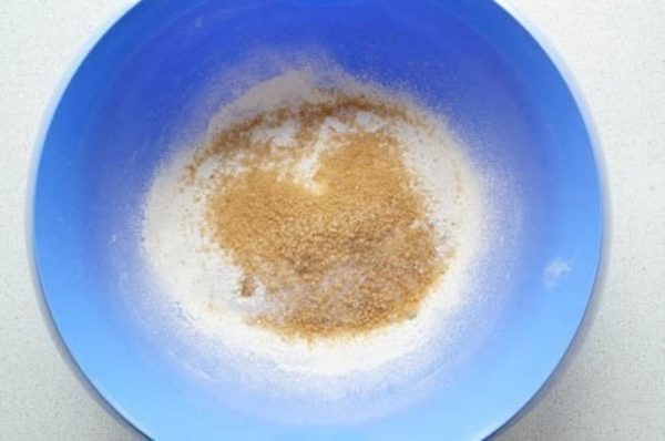 In a deep bowl, combine all the dry ingredients and whisk them together for about 30 seconds. This ensures an even distribution of all components.


