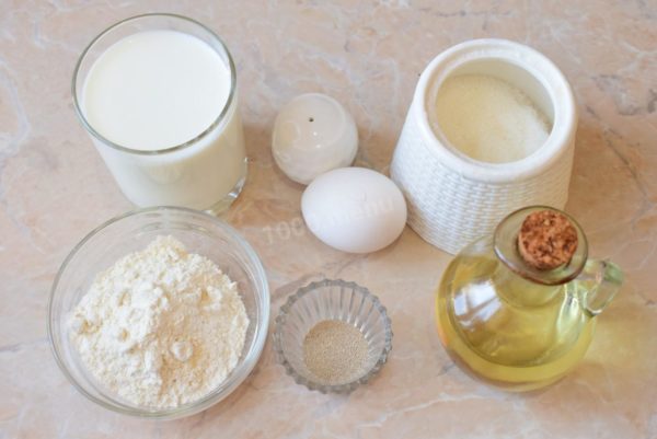 How to make fluffy yeast pancakes with milk? Gather all the necessary ingredients for this recipe. It's a good idea to sift the flour through a sieve in advance to ensure it's well-aerated. You can use milk with any level of fat content.

