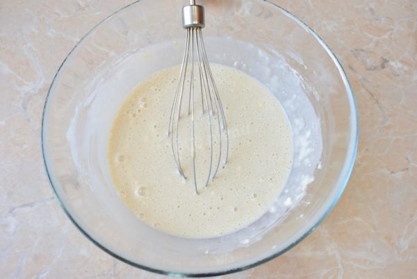 Allow the bowl to rest in a warm location for 10-15 minutes. During this time, the yeast will become active, and you'll notice bubbles forming on the surface.

