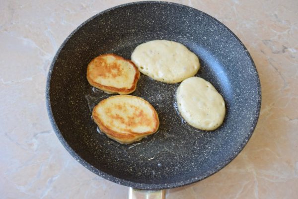 Heat a frying pan and add a small amount of vegetable oil. Spoon the pancake batter onto the pan and cook the pancakes over low heat for about a minute on each side, until they turn a lovely golden brown.


