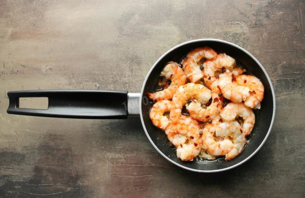 Add the ground pepper, chili pepper, salt, and dried rosemary to the pan. The pepper and rosemary will impart a unique flavor to the dish. How long to sauté the shrimp in the pan? Cook them for about 1-2 minutes, stirring constantly.



