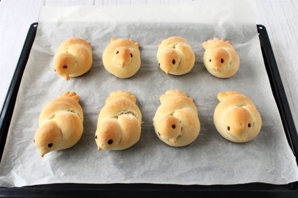 Bake the larks in a preheated oven at 180°C for 20-25 minutes or until they turn golden brown. Monitor the baking time based on your oven's characteristics.


