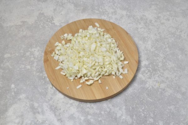 Dice the cabbage into small pieces. While some recipes suggest grating the cabbage with a coarse grater for lazy cabbage rolls, this one uses diced cabbage. You can also use Napa cabbage instead of white cabbage.


