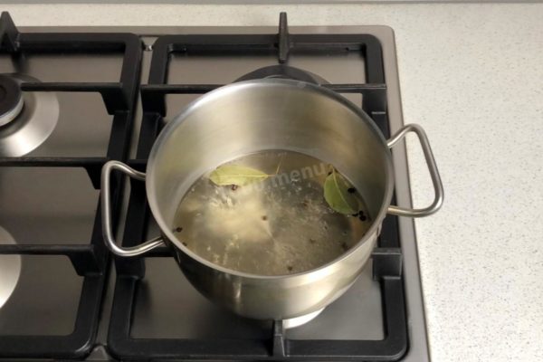 Place the saucepan with the brine on the heat source and bring it to a boil. Allow it to boil for a few minutes to ensure the salt and sugar are fully dissolved.

