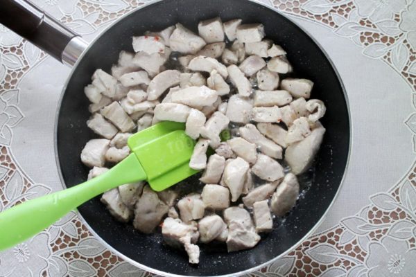Heat vegetable oil in a frying pan and quickly sear the pork on all sides to seal in the juices.

