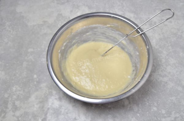 Stir the batter. With a small amount of milk, the batter will be thick, which is what you want. A thick batter is easier to mix until smooth and ensures there are no lumps.


