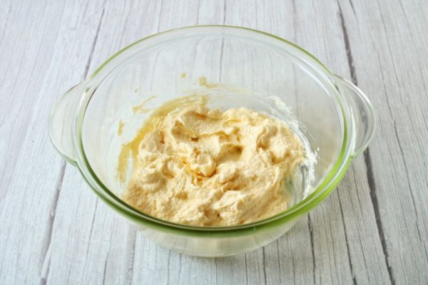 Cream together the softened butter and sugar. You can use a fork or whisk for this process.

