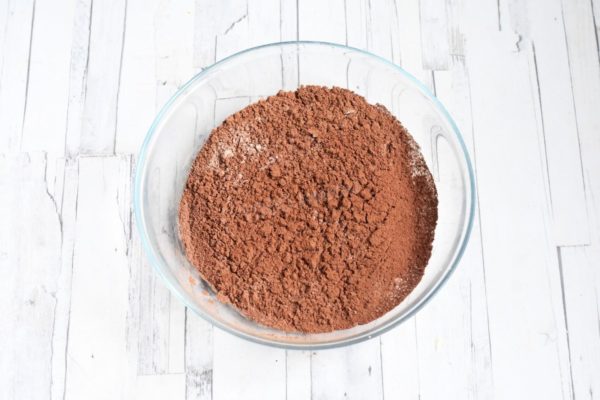 In a separate bowl, sift together the flour, cocoa, and baking powder.

