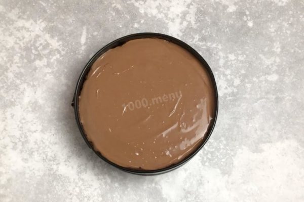 Pour the filling onto the cooled crust, smoothing the top. Lightly tap the pan on the table to release any trapped air bubbles.

