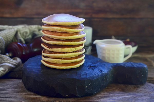 Serve the classic milk pancakes with toppings such as honey, jam, sour cream, or any other preferred toppings. Enjoy your meal!