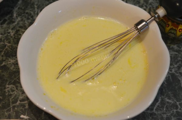 Slightly warm the milk and gradually pour it into the egg mixture.

