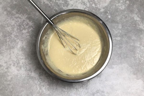 Let the melted butter cool, then add it to the pancake batter. Stir until well combined. The butter will impart a delightful nutty flavor to the pancakes. The batter should resemble thick sour cream.

