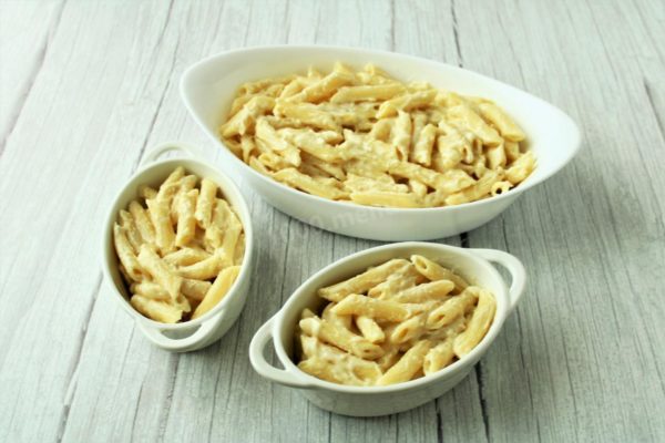 Transfer the pasta mixture to a baking dish greased with a small amount of butter. You can use one large baking dish or several individual portion dishes.

