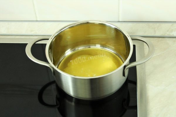 Meanwhile, prepare the cheese béchamel sauce. Melt the butter in a small saucepan over medium heat.

