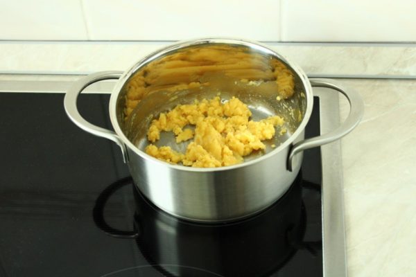Add the flour and stir continuously. Allow the mixture to cook over low heat for 1-2 minutes, stirring constantly.

