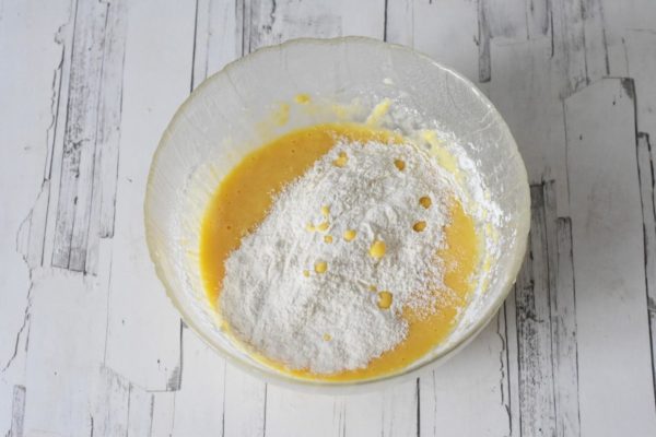 Gradually mix the dry ingredients into the yolk mixture until well combined and smooth.


